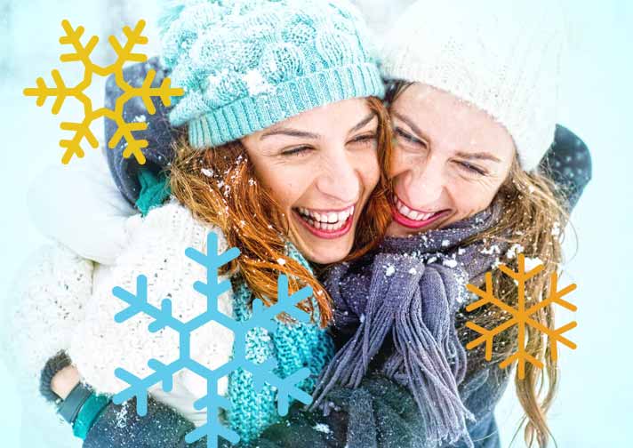 Girls in tuques hugging