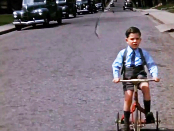 Young Leonard Cohen on a Tricycle